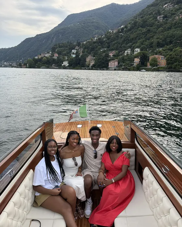 Sharonda and friends on a lake in Italy